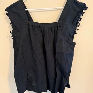 Chic Black Sleeveless Top with Pom Pom Details